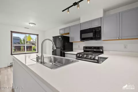 Kitchen - 424 E Manor Ave, Anchorage, AK 99501 photo 9 of 14