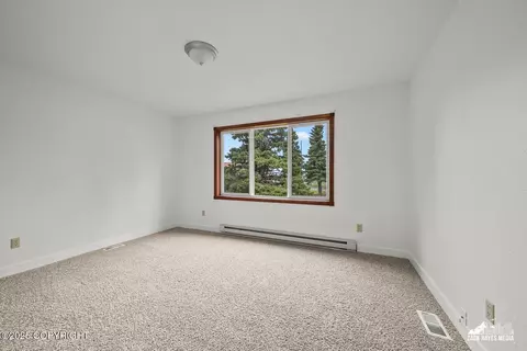 Bedroom - 424 E Manor Ave, Anchorage, AK 99501 photo 8 of 9