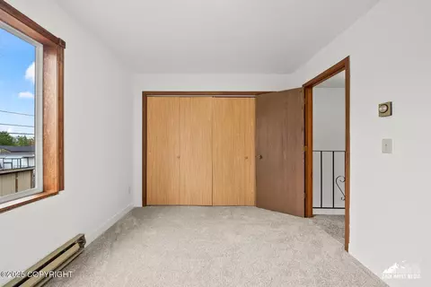 Bedroom - 424 E Manor Ave, Anchorage, AK 99501 photo 4 of 9