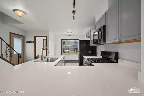 Kitchen - 424 E Manor Ave, Anchorage, AK 99501 photo 8 of 14