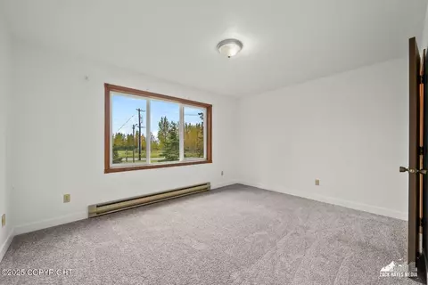 Bedroom - 424 E Manor Ave, Anchorage, AK 99501 photo 1 of 9