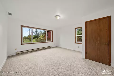 Bedroom - 424 E Manor Ave, Anchorage, AK 99501 photo 5 of 9