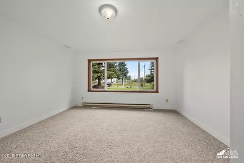 Living - 424 E Manor Ave, Anchorage, AK 99501 photo 4 of 7