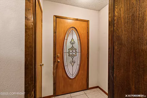 Entry Way - 3443 Wiley Post Loop, Anchorage, AK 99517 photo 1 of 2
