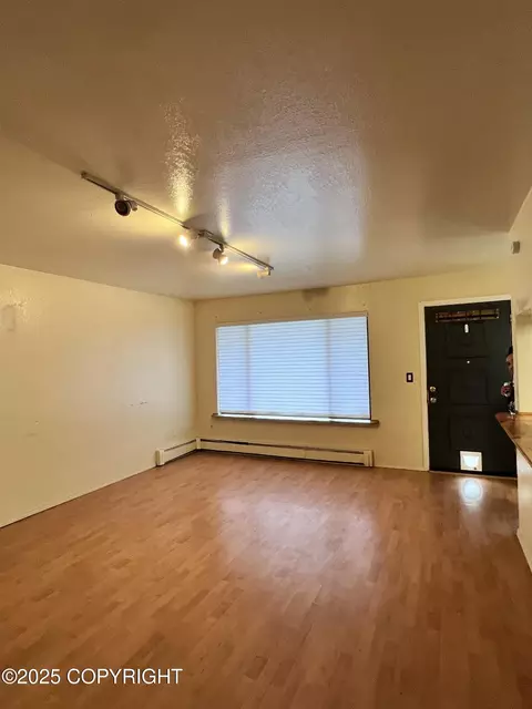 Living - 6124 E 12th Ave # D7, Anchorage, AK 99504 photo 1 of 4
