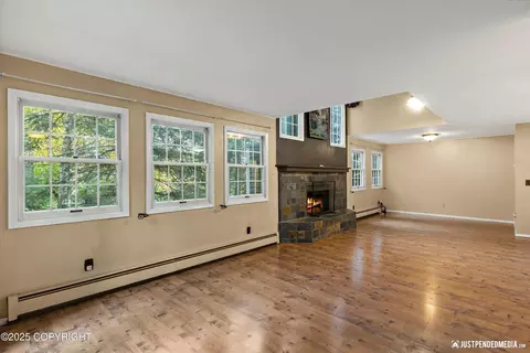 Living - 3601 Raspberry Rd # 1A, Anchorage, AK 99502 photo 1 of 6