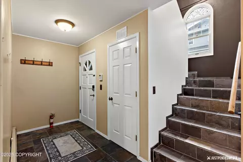 Entry Way - 3601 Raspberry Rd # 1A, Anchorage, AK 99502 photo 1 of 2