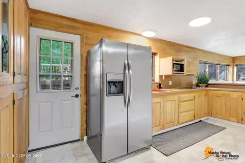 Kitchen - 6607 Chevigny St, Anchorage, AK 99502 photo 7 of 9
