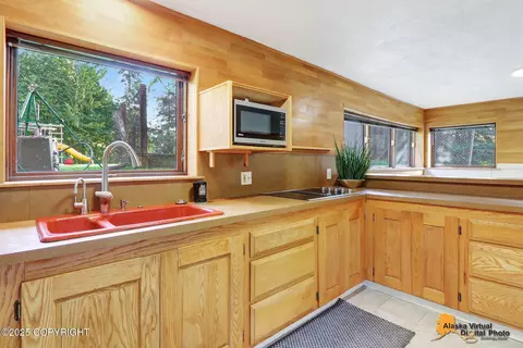 Kitchen - 6607 Chevigny St, Anchorage, AK 99502 photo 8 of 9