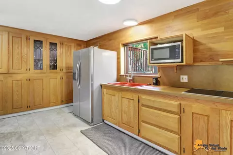 Kitchen - 6607 Chevigny St, Anchorage, AK 99502 photo 9 of 9