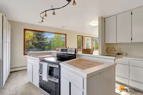 Kitchen - 6607 Chevigny St, Anchorage, AK 99502 photo 5 of 9