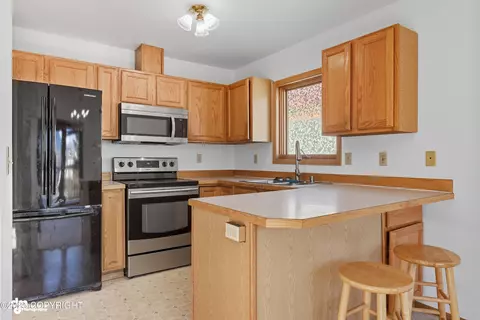 Kitchen - 8512 Cross Pointe Loop, Anchorage, AK 99504 photo 1 of 2