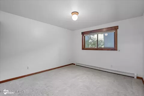 Bedroom - 1877 E Tudor Rd # E-101, Anchorage, AK 99507 photo 1 of 4