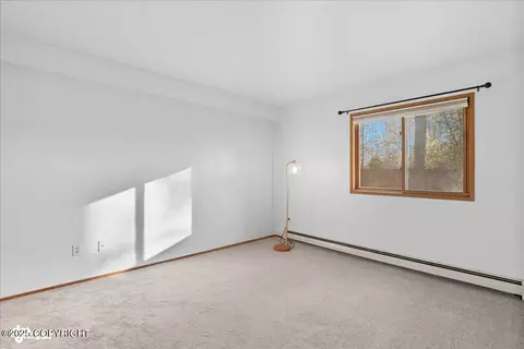 Bedroom - 1877 E Tudor Rd # E-101, Anchorage, AK 99507 photo 3 of 4