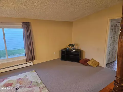 Living - 4338 E 9th Ave, Anchorage, AK 99508 photo 2 of 5