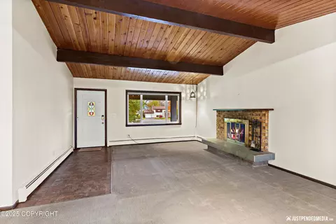 Living - 2820 Wiley Post Ave, Anchorage, AK 99517 photo 3 of 4