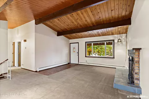 Living - 2820 Wiley Post Ave, Anchorage, AK 99517 photo 1 of 4