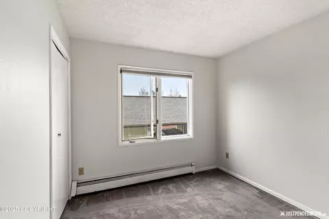 Bedroom - 7728 Boundary Ave # E2, Anchorage, AK 99504 photo 2 of 2