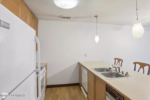 Kitchen - 5300 E 4th Ave # 104, Anchorage, AK 99508 photo 1 of 2