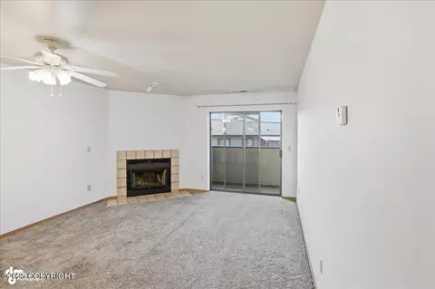 Living - 5300 E 4th Ave # 104, Anchorage, AK 99508 photo 1 of 2