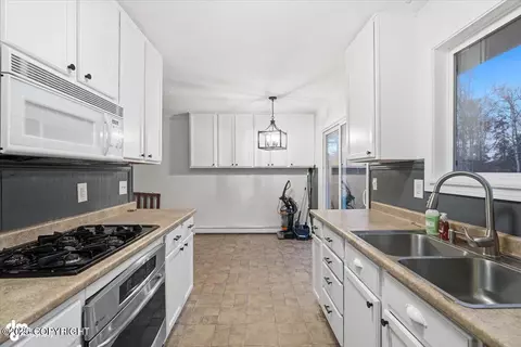 Kitchen - 17705 Teklanika Dr, Eagle River, AK 99577 photo 2 of 3