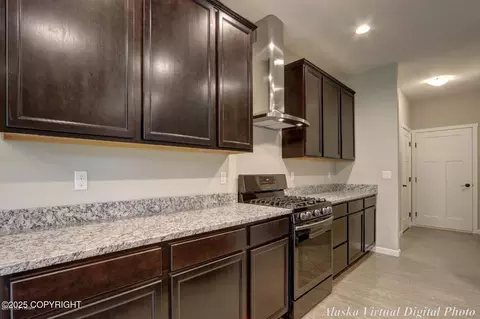 Kitchen - 4121 E Harman Loop, Wasilla, AK 99654 photo 3 of 4