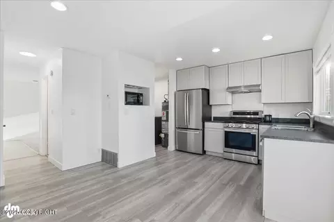 Kitchen - 1201 Elegante Ln, Anchorage, AK 99501 photo 2 of 3