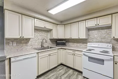 Kitchen - 5231 Huffman Rd, Anchorage, AK 99516 photo 2 of 3