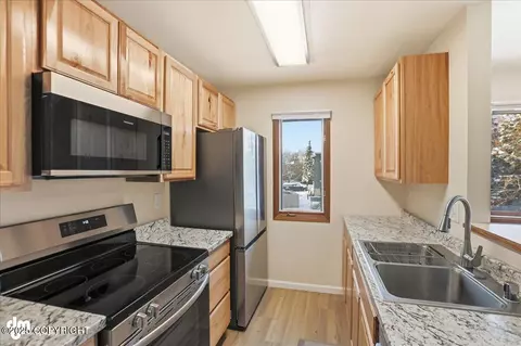 Kitchen - 4211 Folker St # E102, Anchorage, AK 99508 photo 3 of 4