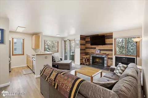 Living - 4211 Folker St # E102, Anchorage, AK 99508 photo 4 of 5