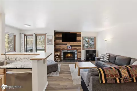Living - 4211 Folker St # E102, Anchorage, AK 99508 photo 1 of 5
