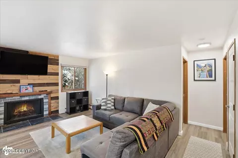 Living - 4211 Folker St # E102, Anchorage, AK 99508 photo 3 of 5
