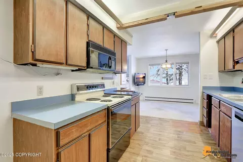 Kitchen - 6911 Gemini Dr # A-4, Anchorage, AK 99504 photo 4 of 4