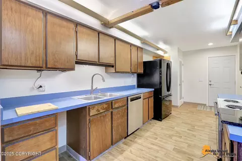 Kitchen - 6911 Gemini Dr # A-4, Anchorage, AK 99504 photo 3 of 4