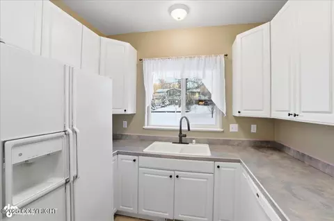 Kitchen - 11240 Echo St, Eagle River, AK 99577 photo 2 of 3