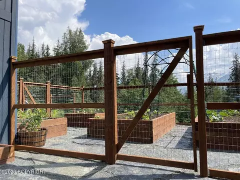 Exterior - 8130 Harmany Ranch Rd, Eagle River, AK 99577 photo 5 of 12
