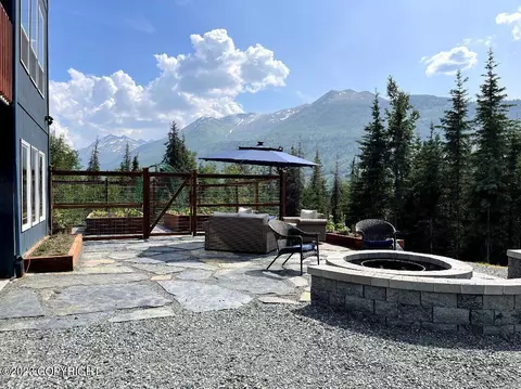 Exterior - 8130 Harmany Ranch Rd, Eagle River, AK 99577 photo 4 of 12