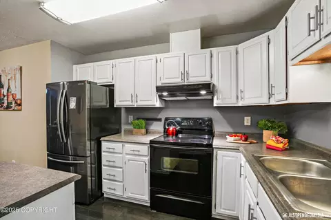 Kitchen - 4510 Wright St # 23, Anchorage, AK 99507 photo 5 of 7