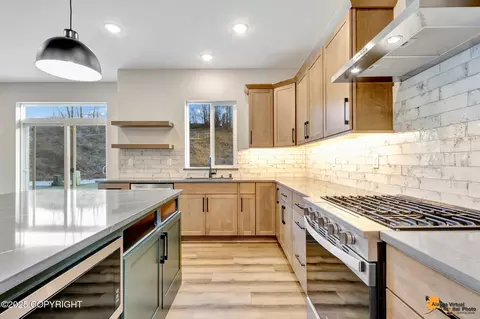 Kitchen - 8869 Chalk Hill Loop, Anchorage, AK 99502 photo 6 of 7