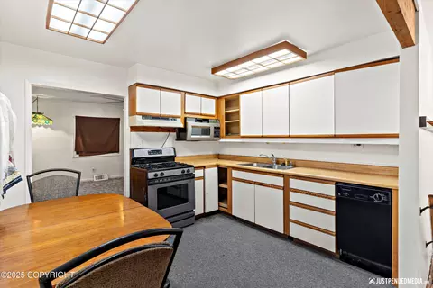 Kitchen - 4100 Willow Dr, Anchorage, AK 99517 photo 2 of 3
