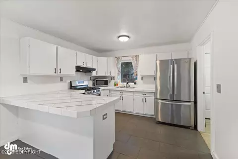 Kitchen - 1035 E 12th Ave, Anchorage, AK 99501 photo 1 of 2