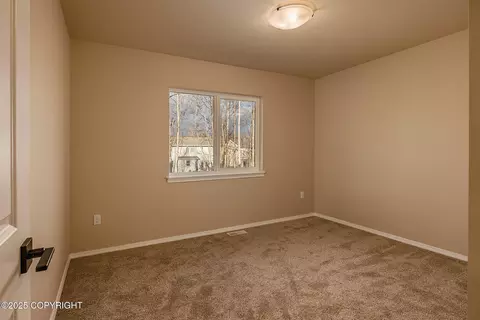 Bedroom - 1594 E Hidden Ranch Loop, Palmer, AK 99645 photo 4 of 9