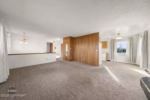 Living - 7310 E 17th Ave, Anchorage, AK 99504 photo 3 of 6