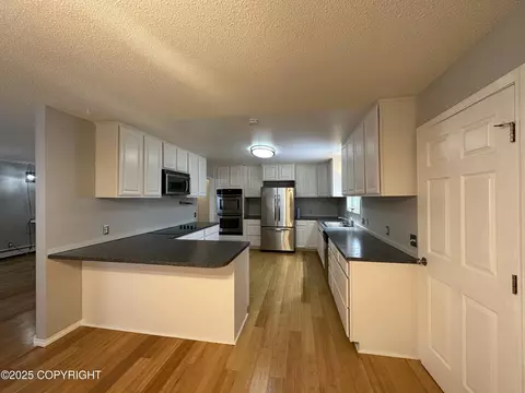 Kitchen - 5231 E 98th Ave, Anchorage, AK 99507 photo 2 of 5