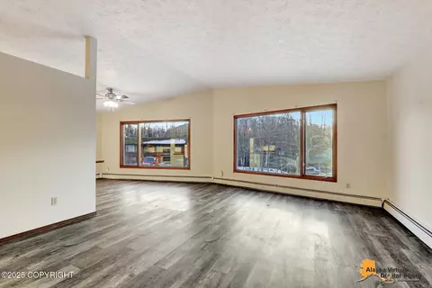 Living - 17337 Teklanika Dr, Eagle River, AK 99577 photo 4 of 8