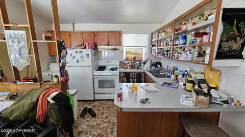 Kitchen - 4103 E 3rd Ave, Anchorage, AK 99508 photo 3 of 4
