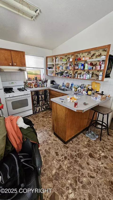 Kitchen - 4103 E 3rd Ave, Anchorage, AK 99508 photo 4 of 4