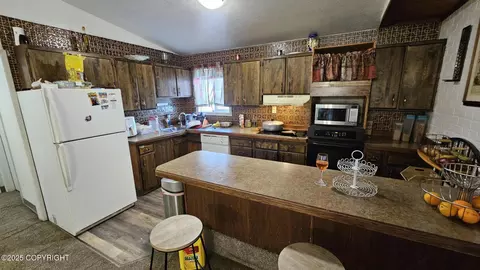 Kitchen - 4103 E 3rd Ave, Anchorage, AK 99508 photo 1 of 4