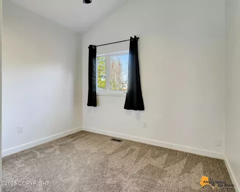 Bedroom - 18820 Sarichef Loop, Eagle River, AK 99577 photo 6 of 7