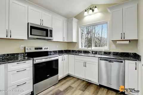 Kitchen - 18820 Sarichef Loop, Eagle River, AK 99577 photo 3 of 4